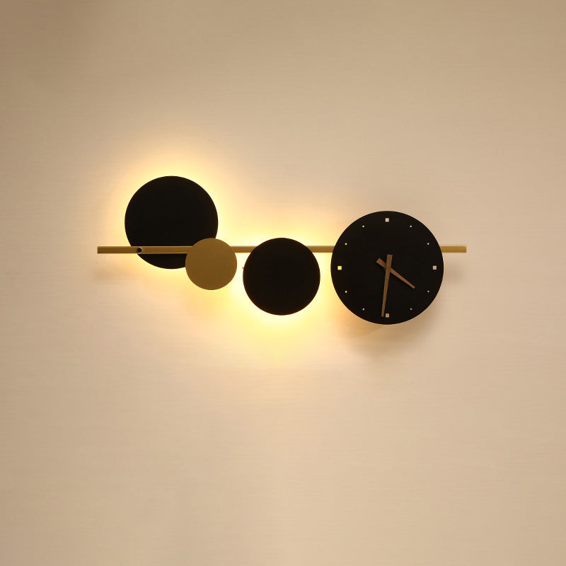 Reloj de pared escultural WOMO con luz LED-WM6087